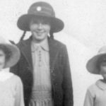 Joan (centre) in her Hampton High school uniform